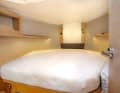 The forward berth can be considerably extended by inserting cushions on the sides