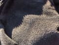 Soft, fluffy surface: Fleece is the most common material on the market; it is very versatile, but it tends to absorb sweat odours over time