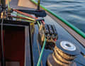 Halyards, trim lines and the jib sheet are operated at the front on the coachroof