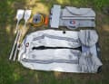 The equipment includes a foot pump that can be switched to high pressure. Instructions and valve spanner are missing. All-round scuff plate