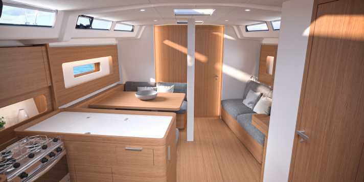   Der relativ weit achtern stehende Mast wird im Salon abgestützt. Die Dinette an Backbord erinnert an das Arrangement im Topmodell First Yacht 53