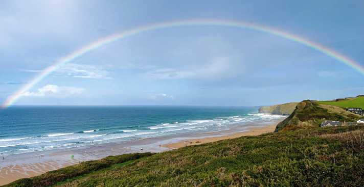 As here in Watergate Bay, Cornwall often has wide and gently sloping sandy beaches, especially at low tide.