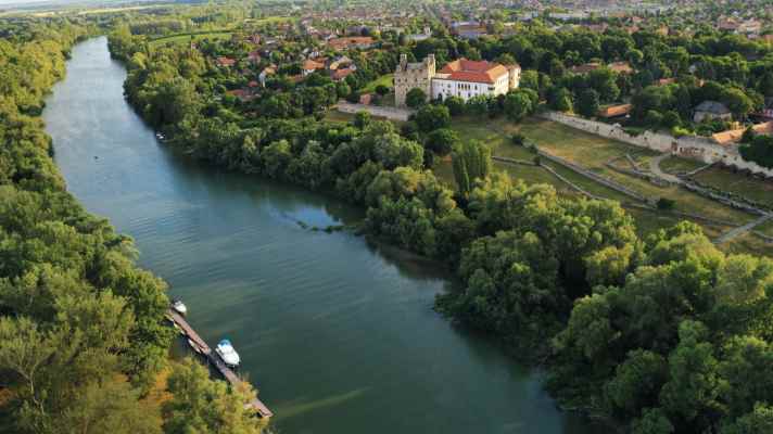 Jetty on the Bodrog River in Sárospatak. In the background is the castle of Prince Rákóczi, who enforced religious freedom in Hungary and brought many German settlers to the country