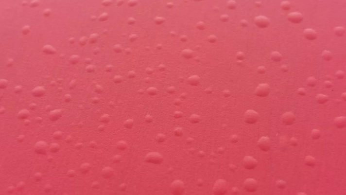 Hopefully you'll never see your board like this: Close-up of the surface of a hardboard that has been stored warm and damp in a bag.