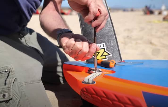Quick adjustments on the beach allow more testing time on the water