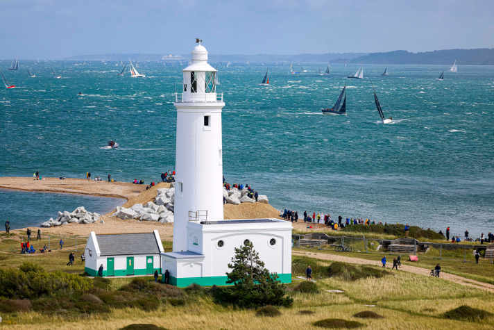 Opposite: At the start of the Rolex Fastnet Race off Cowes, the Solent showed its nasty side with strong westerly winds. | e.