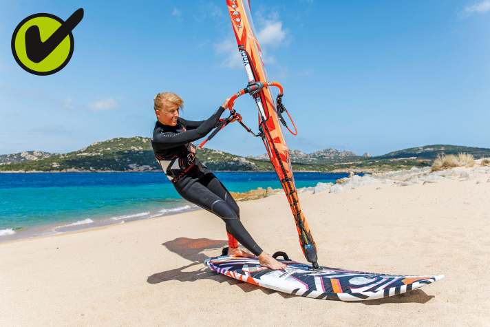 Do not set the boom below shoulder height and adjust the harness lines so that they end just above your harness hook when standing on the board with the sail close-hauled.