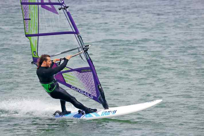 The front foot is turned in the direction of travel