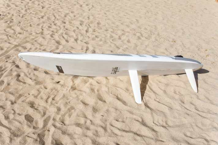 A centreboard or centre fin minimises lateral drift in light winds