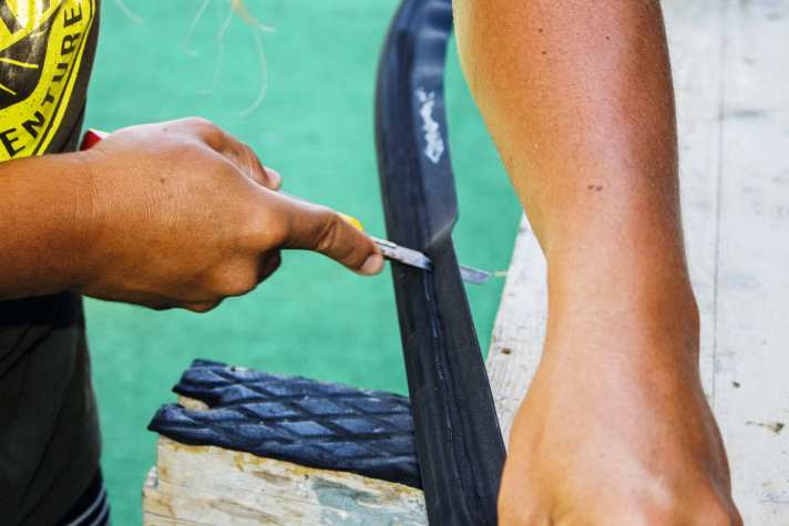 Cut off the excess with a really sharp cutter at an angle and not too close.