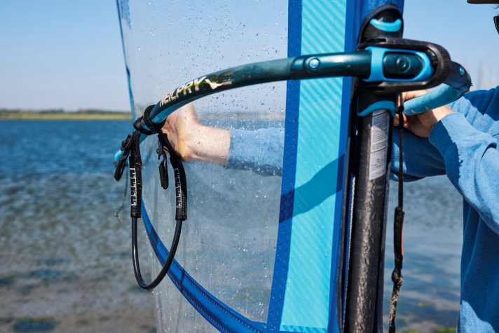 In the right trim, the sail may almost touch the boom.