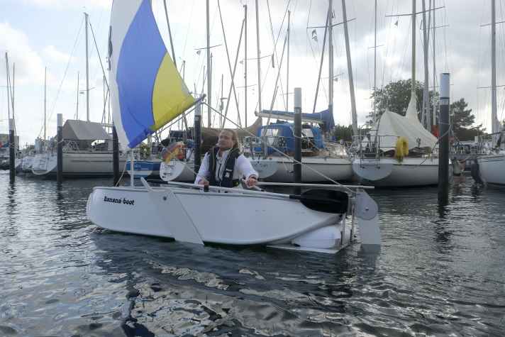 The banana boat with centreboards and a trim tab at the stern.