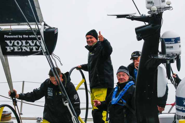   Rascal face, thumbs up and simply happy: Bouwe Bekking after his team Brunel's successful coup in the harbour race in Newport