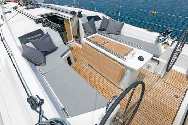 Inviting. The cockpit thwarts are long enough for sunbathing. The life raft is also stored in the massive cockpit table