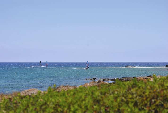 Perfectly flat water behind the headland and constant wind make Kountoura one of the top spots in western Crete.
