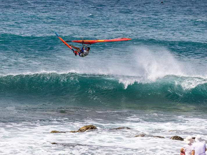 Eyes closed and through: Liam Dunkerbeck over the rocks of Ponta Preta