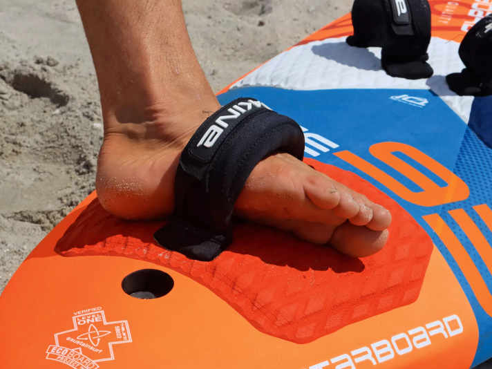 Lateral support is more important for freestyling than pressure from the top of the strap.