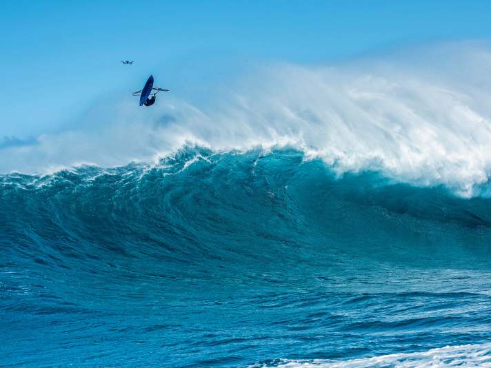 Doing an aerial over the critical part of the wave is reserved for the most experienced Jaw surfers.
