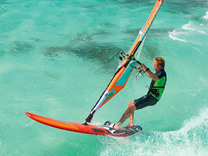 Tight jibe: You lean back and put weight on the tail