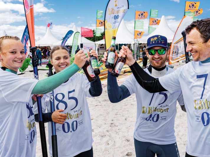 Die Bitburger 0,0% SUP Challenge findet auch 2023 statt, mit anschließender Erfrischung in der Bitbuger Beach Base.