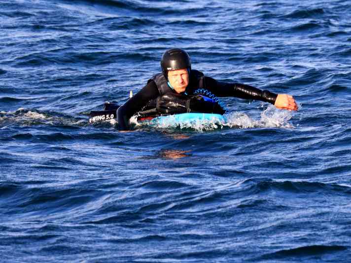 The best thing to do with a broken wing is to roll it up and lie on it. This way it won't get lost while paddling