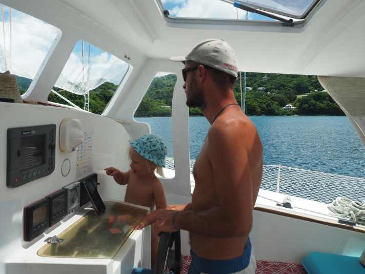   Father and daughter at the helm of the new floating home
