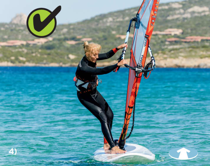 Correct: The sail is hoisted tightly with a wide grip on the boom