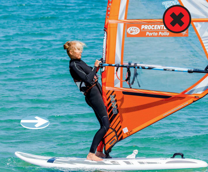 Wrong: The arms are bent and pull the rig towards the body