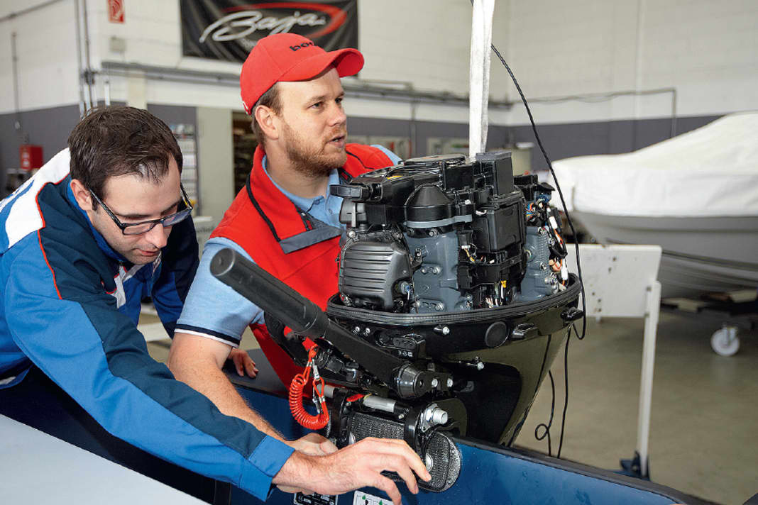 Before going out on the water for the test runs, each engine is attached, secured and tuned.