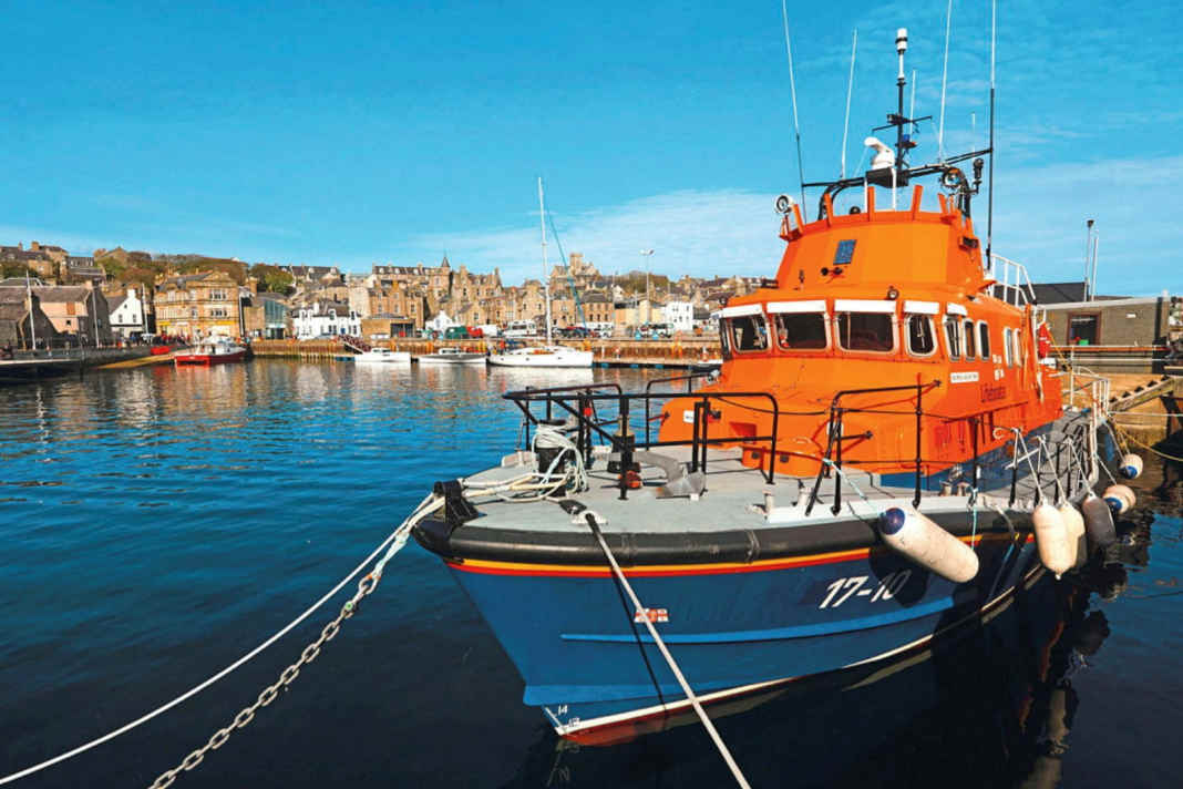 Mooring of the sea rescuers in Lerwick, behind them Victoria Pier.