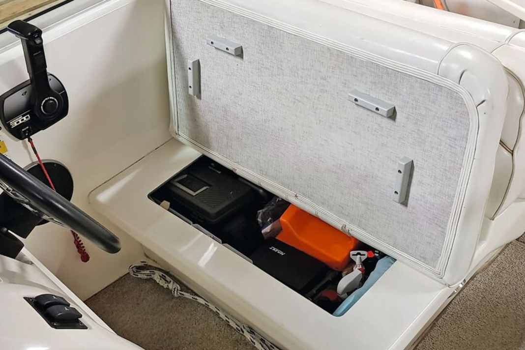 The storage space under the bench seat of our 24-foot Sea-Ray was originally separated by the cockpit table top