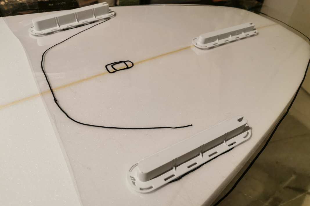 A template helps to indicate the fin boxes. Copied here from existing boards so that the position and angle are correct.