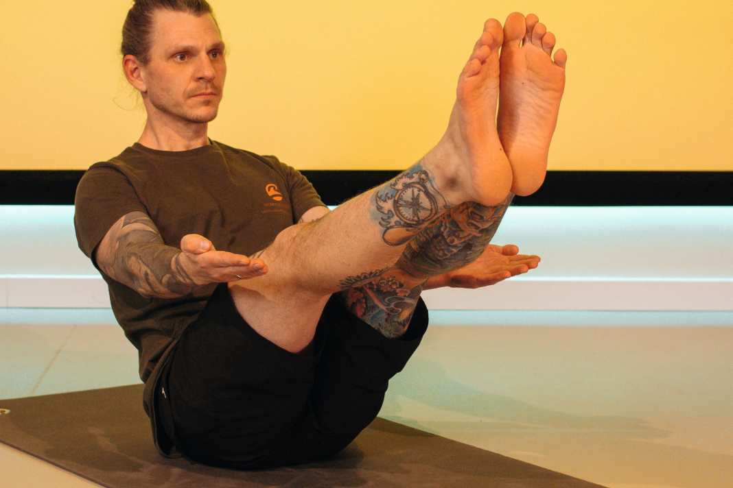 Yoga-Übung Das Boot