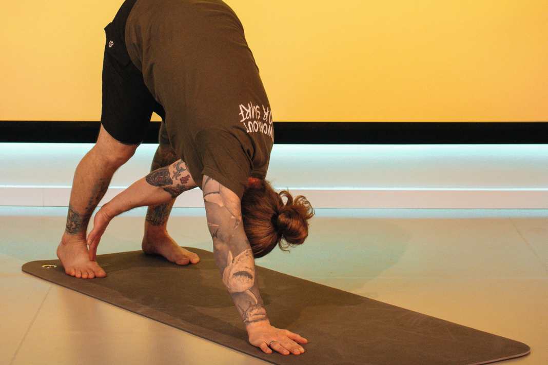 Yoga-Übung Herabschauener Hund