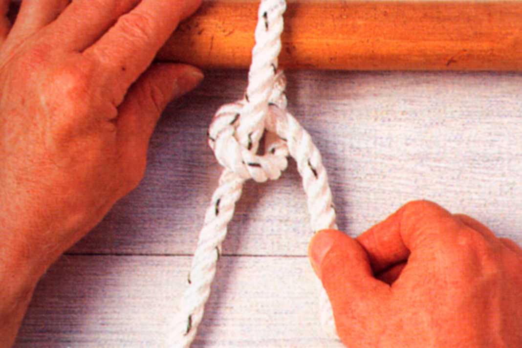 Place the working end around the attachment point. Make a half stroke around the standing part.