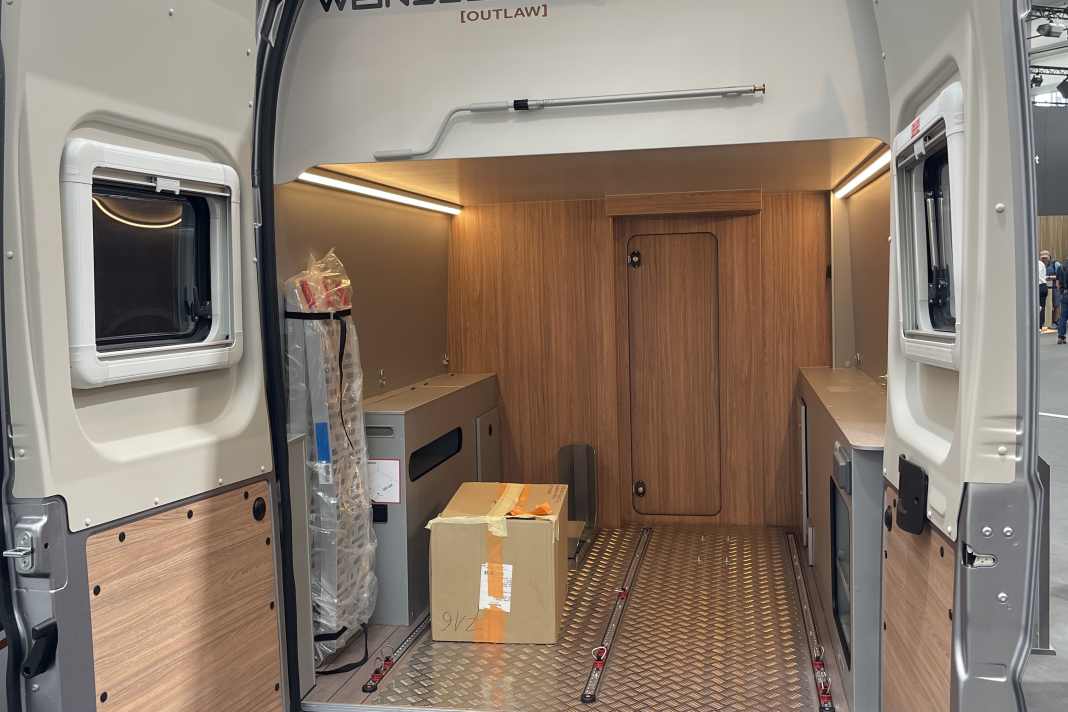 1. windsurfers who don't want to constantly hoist their equipment onto the roof of the vehicle need sufficient storage space under the bed in the van.