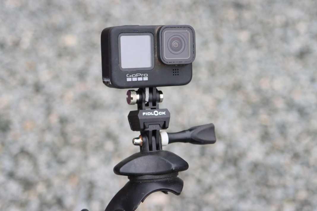 The Fidlock Pinclip Mount is inserted between the cam and the actual mount