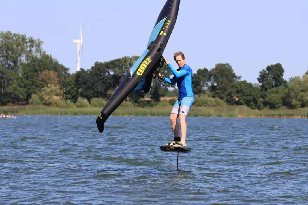 Gain momentum on a half-wind course and check the free space downwind.
