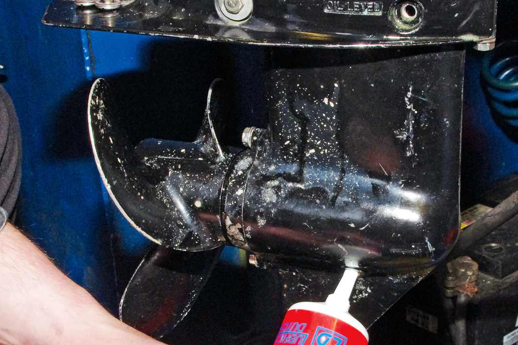 Place the tube on the drain plug and press in the oil until ...