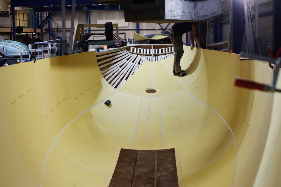 The many thermally moulded foam panels are bonded together in an auxiliary framework