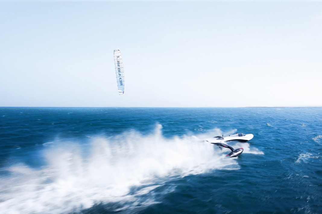 Above the kite, below the tri hurtling across the water during one of the test rides. The 80-knot mark is still a long way off.