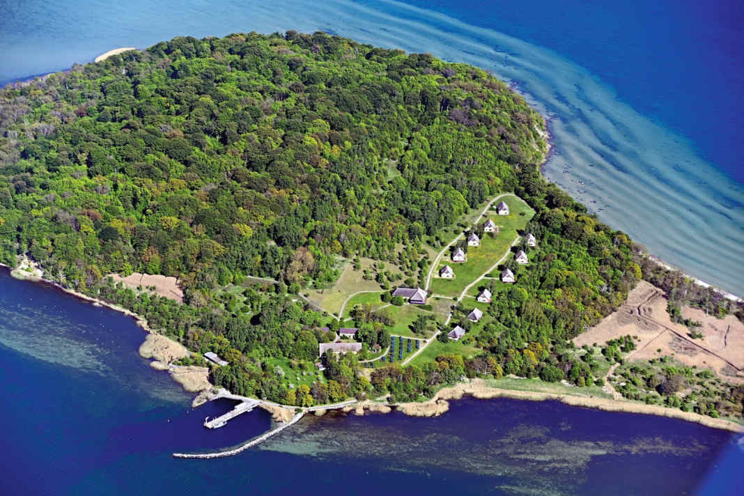Aerial view of Vilm with jetty and holiday resort.
