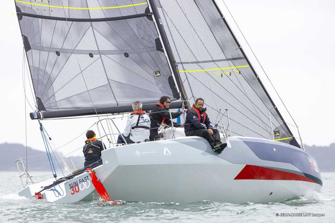Two rudder blades are attached to the stern. The boat is steered using the tiller