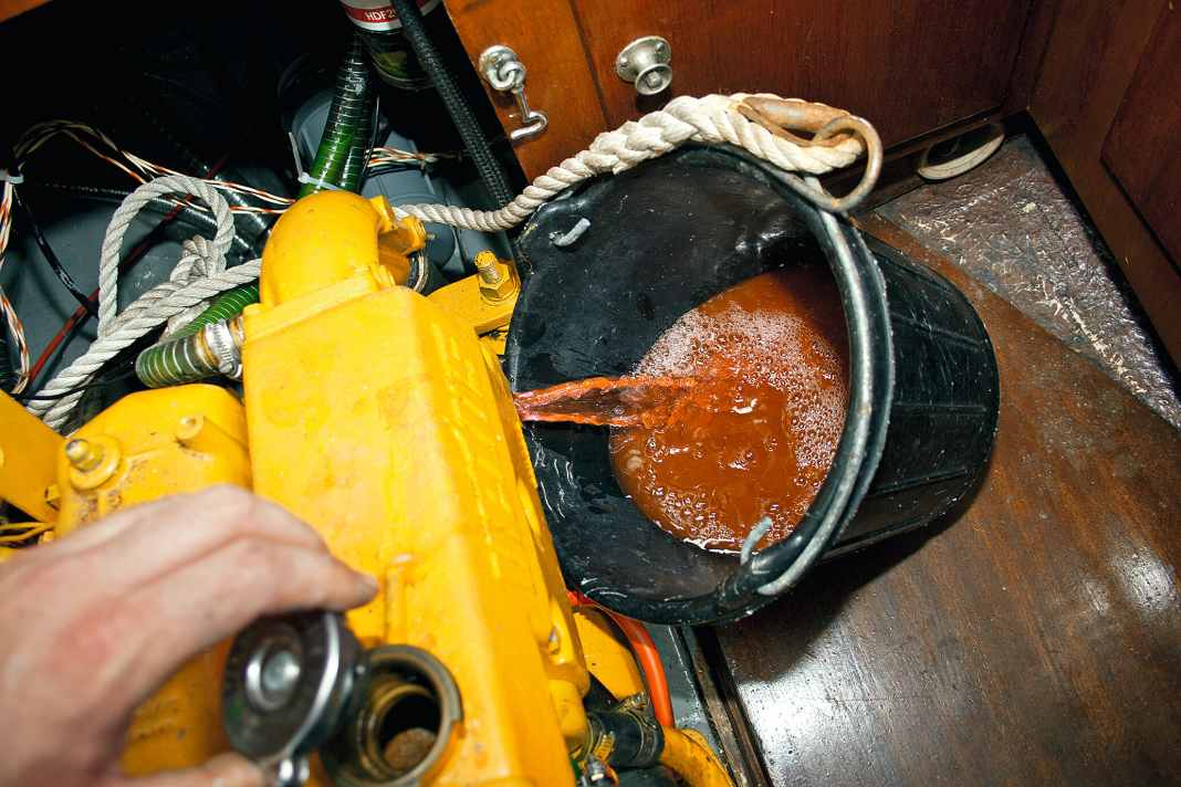 1. drain the coolant Only when the drain plug and coolant cap are open does the fluid drain quickly. Otherwise a vacuum will be created