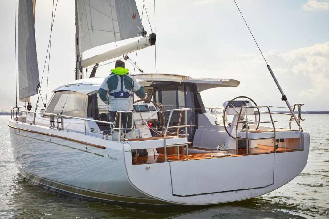 The wheels are positioned correctly for a good forward view; the helmsman looks over the roof or sideways past it