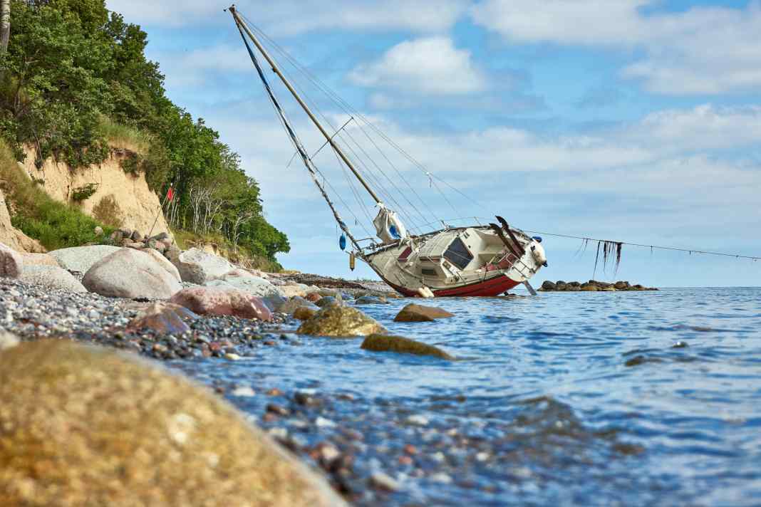 High and dry: stranded yacht of a single-handed sailor off the island of Langeland