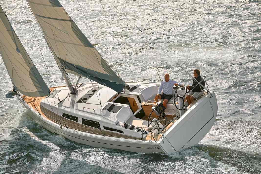 Typical Hanse: wide stern with hatch, self-tacking jib, and the halyards are aft to the helmsman