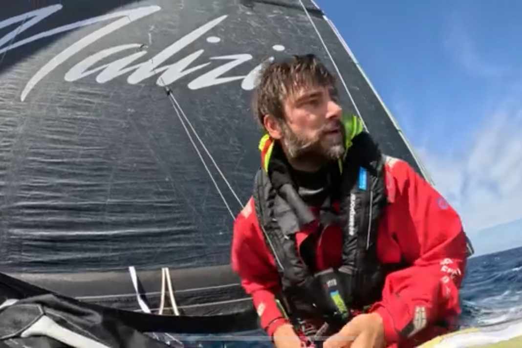 Broken, wet, but in the lead: Boris Herrmann after taking the fractional zero yesterday, before the storm hit hard | Team Malizia/Antoine Auriol