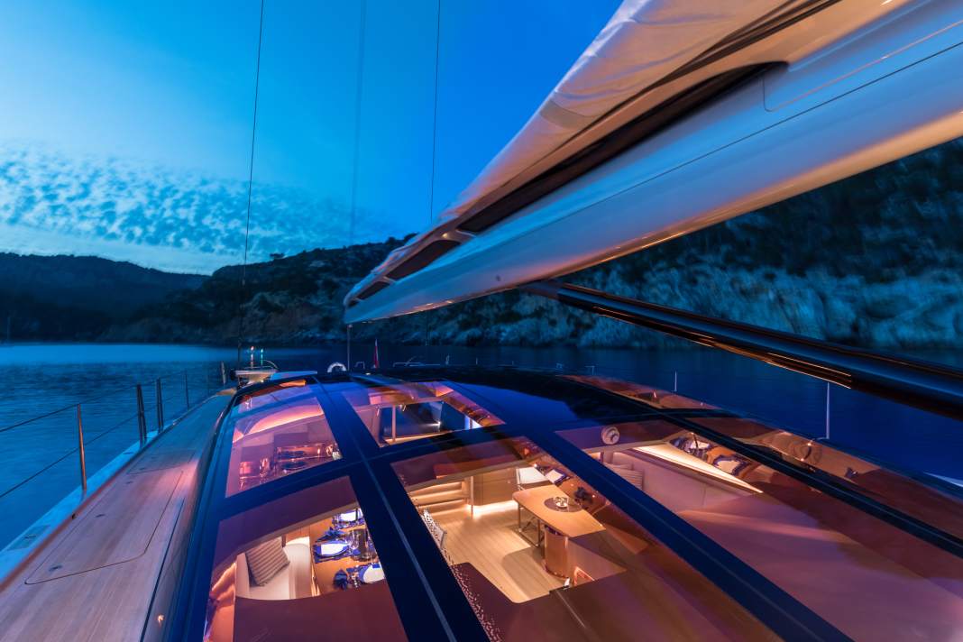 Summer garden: A grid of carbon struts arches over the saloon.  Tilse contributed the hardened laminate glazing for this deckhouse