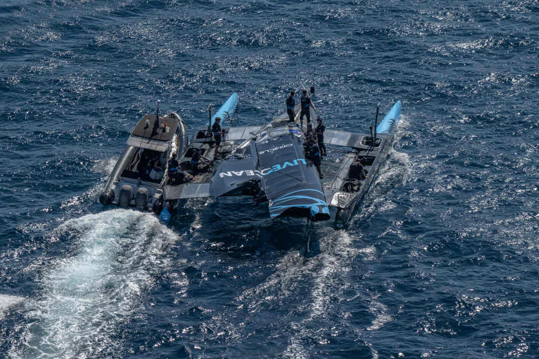 The Kiwis on a "pile of rubble". Their wing rig collapsed after the three races of the day